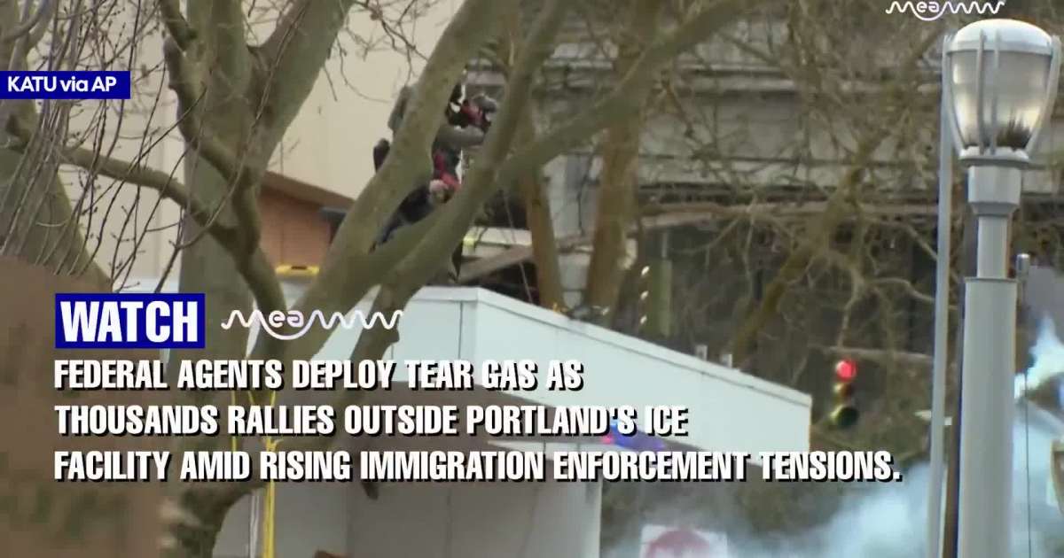 Federal agents deploy tear gas as thousands rallies outside Portland's ICE facility amid rising immigration enforcement tensions.