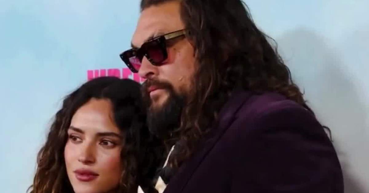 Jason Momoa and Adria Arjona Share a Kiss