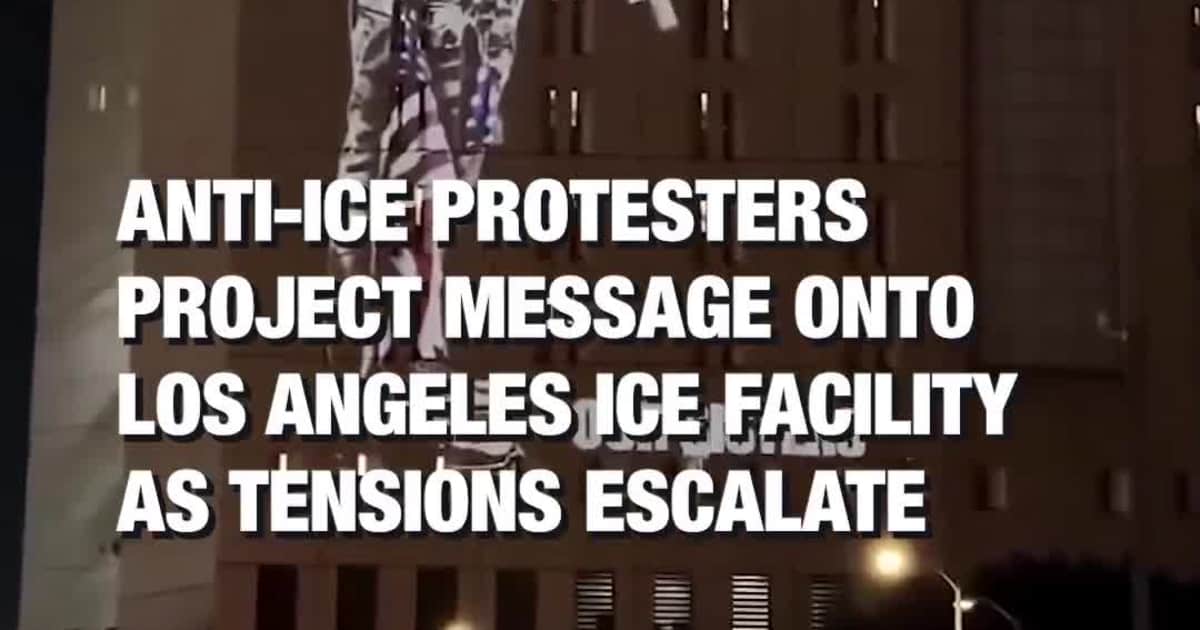 Anti-ICE Protesters Project Message onto Los Angeles ICE Facility as Tensions Escalate