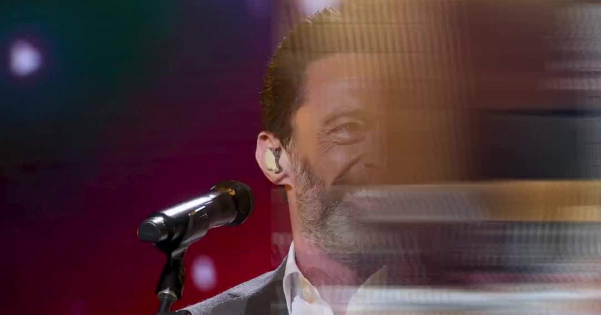 Neil Diamond’s Surprises Hugh Jackman With a Signed Guitar