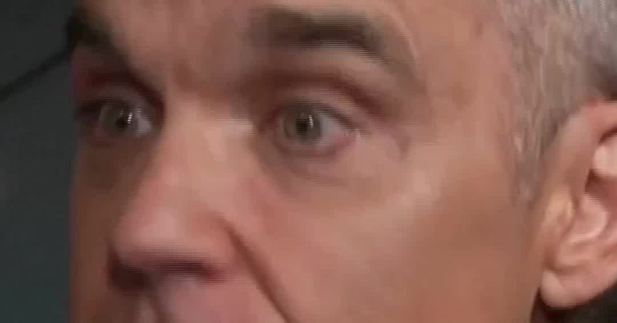 Robbie Williams Beams as Teddy Goes Hollywood