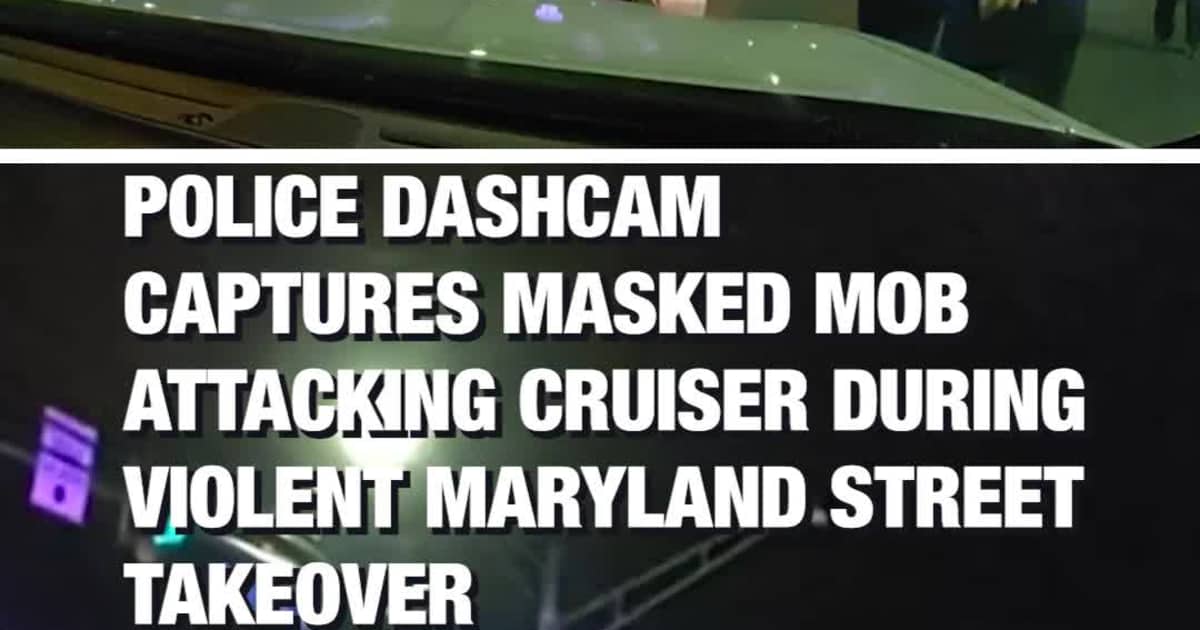 Police Dashcam Captures Masked Mob Att*cking Cruiser During Violent Maryland Street Takeover