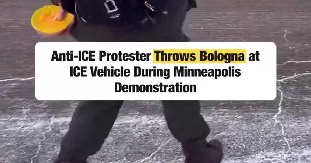 Anti-ICE Protester Throws Bologna at ICE Vehicle During Minneapolis Demonstration